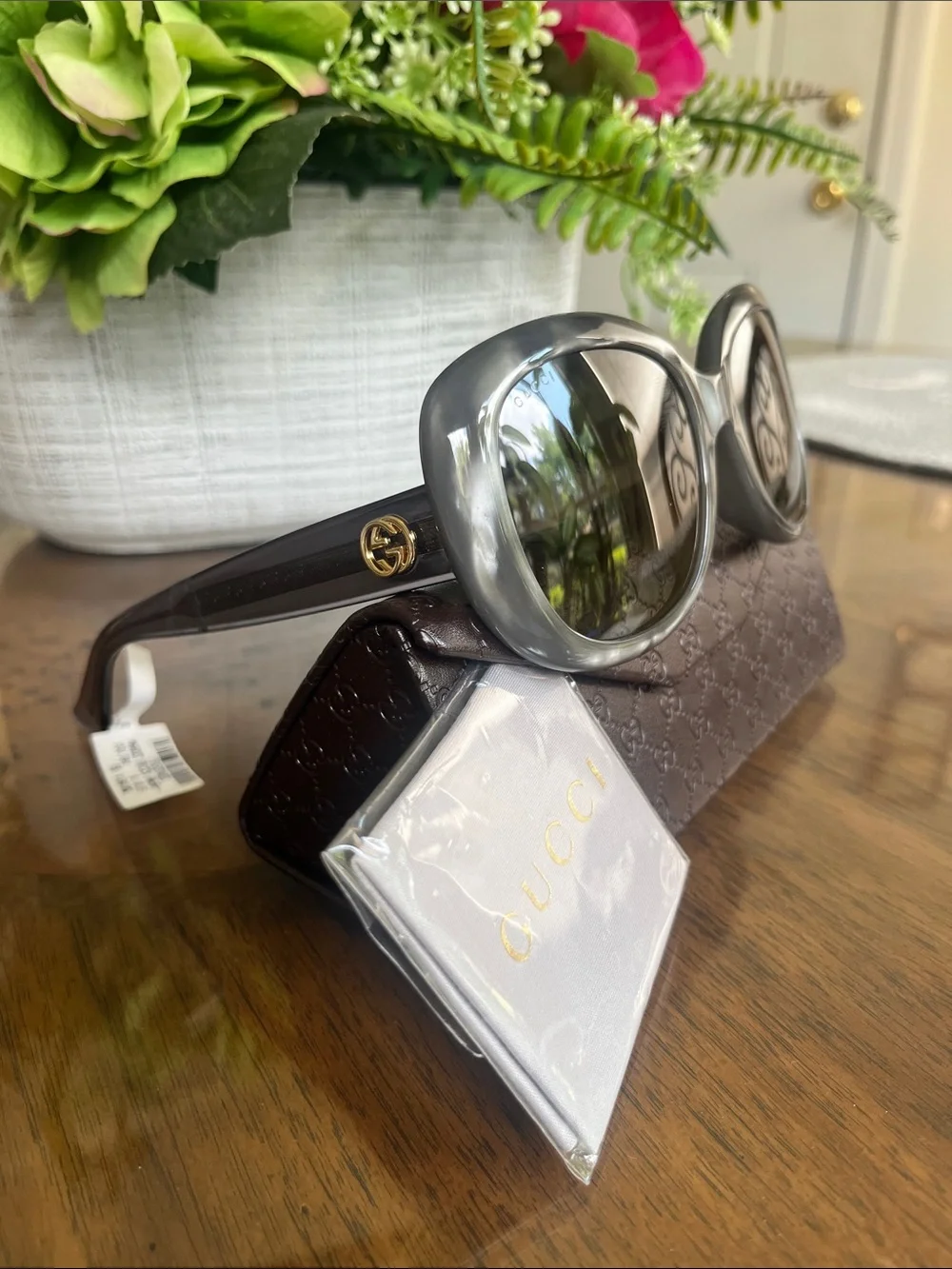 Gucci Women’s Round Sunglasses in Gray with Gold Logo